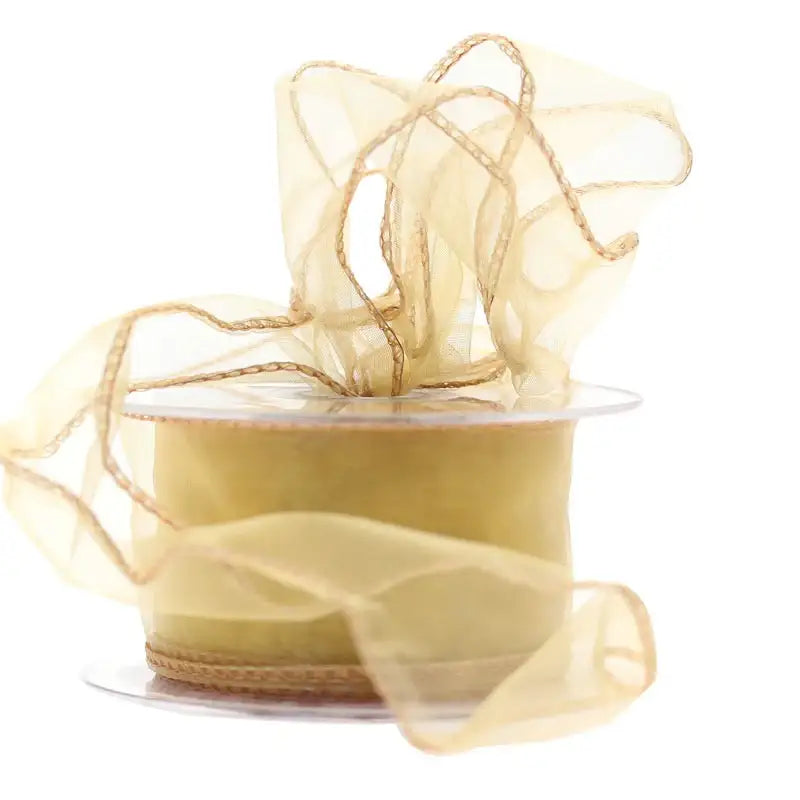 Gold organza ribbon with wired edges for gift wrapping and home décor accents