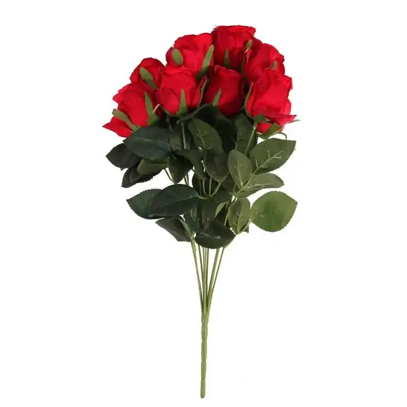 Vibrant red silk roses with lush green leaves, perfect for home décor or gifting on special occasions.