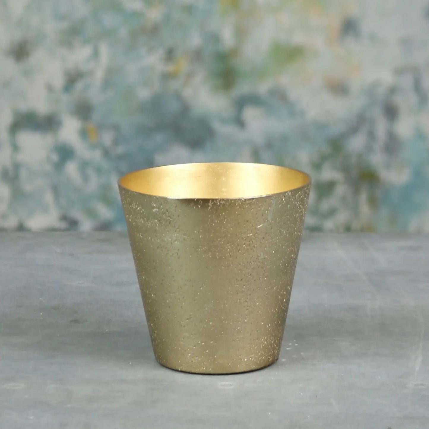 Gold mercury glass candle holder for home décor and celebrations
