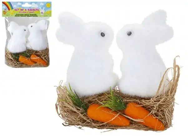 Fluffy white Easter bunnies in straw nest with carrots, perfect for spring home décor or gift sets