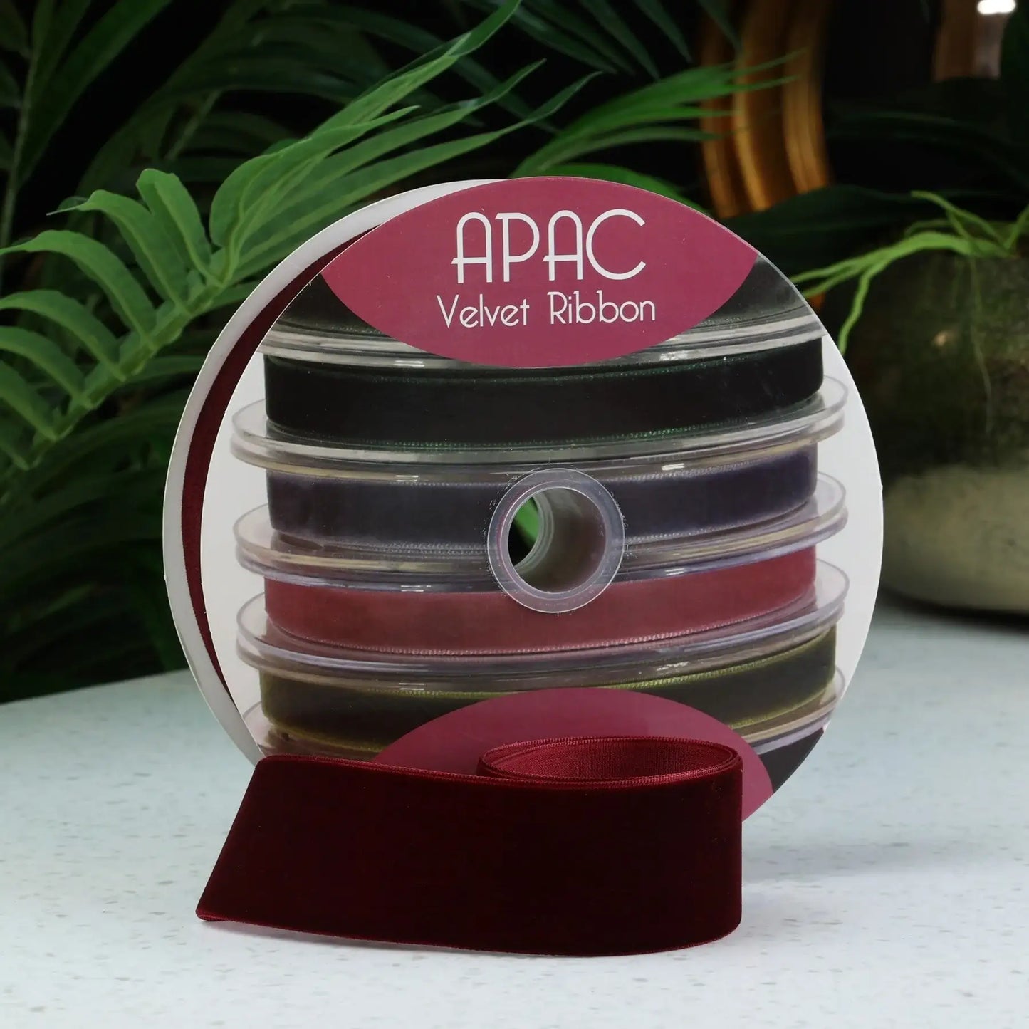 APAC velvet ribbon spools in rich colors, perfect for gift wrapping and home décor accents