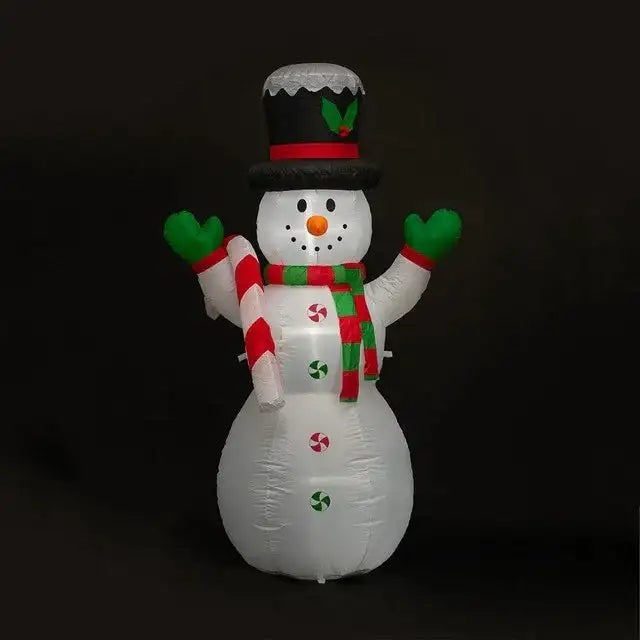 Inflatable Christmas snowman decoration with candy cane, scarf, and top hat on black background