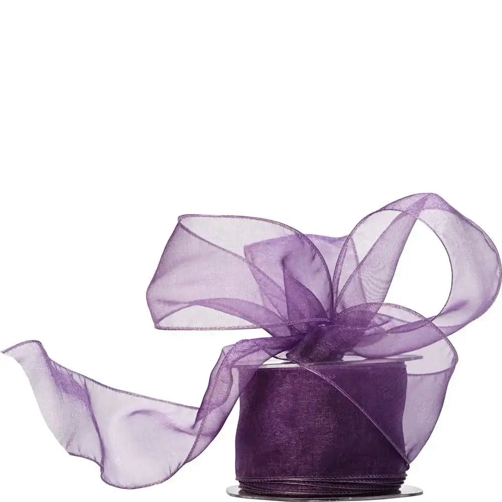 Sheer purple organza ribbon roll with decorative bow for gift wrapping and crafts