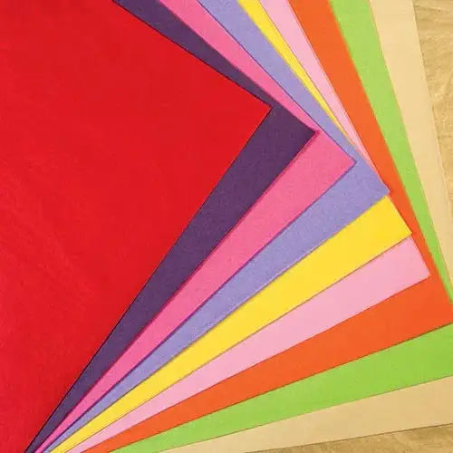 Assorted colorful tissue paper sheets stacked for crafts and gift wrapping
