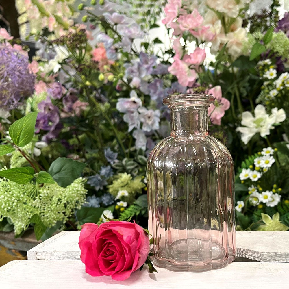Discover the Pink Flora Bottle Glass Vase (13.7cm) at Bristow Direct