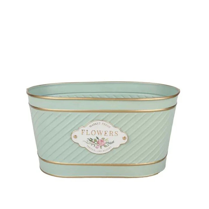 Discover the Mint Green Flowers Badge Oval Zin Planter at Bristow Direct