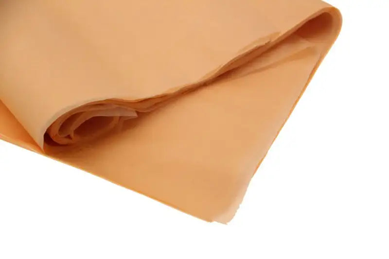 Soft peach tissue paper for gift wrapping and home décor, perfect for birthdays and celebrations