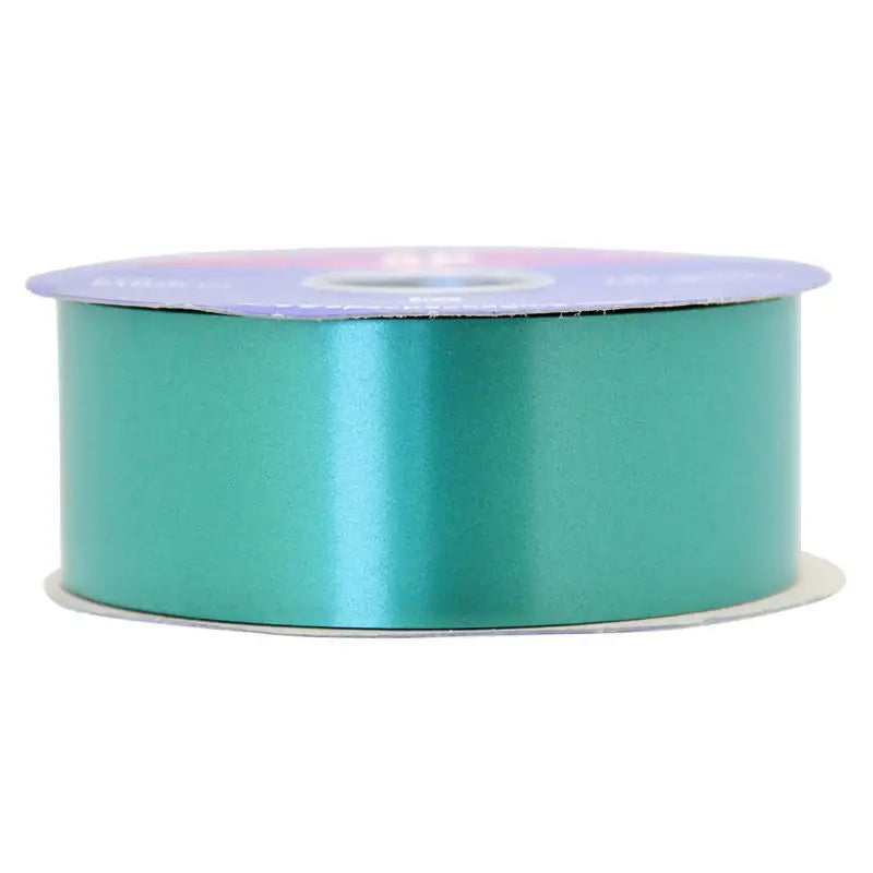 Teal satin ribbon spool for gift wrapping and home décor accents