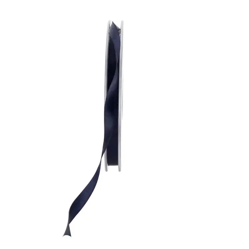 Navy blue satin ribbon spool for gift wrapping and home décor accents
