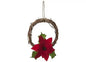 Rustic grapevine wreath with red poinsettia flower and green leaves, holiday home decor