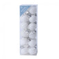 White and glitter Christmas ornaments in clear box, perfect for winter holiday decor and festive home styling