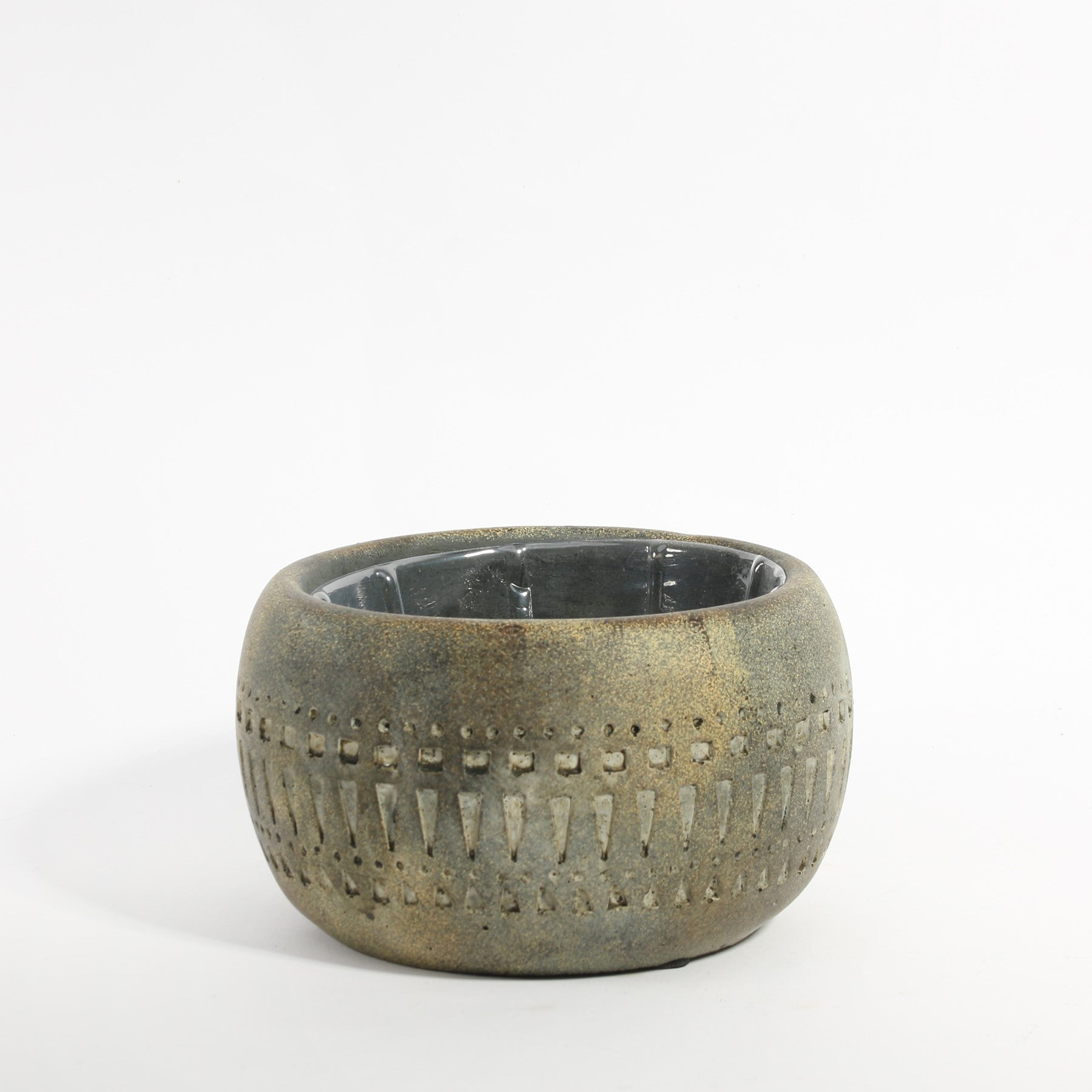 Round ceramic planter with rustic textured finish and geometric carved pattern, home decor accent
