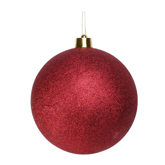 Sparkling red Christmas bauble with gold cap, perfect for festive tree decoration and holiday home décor