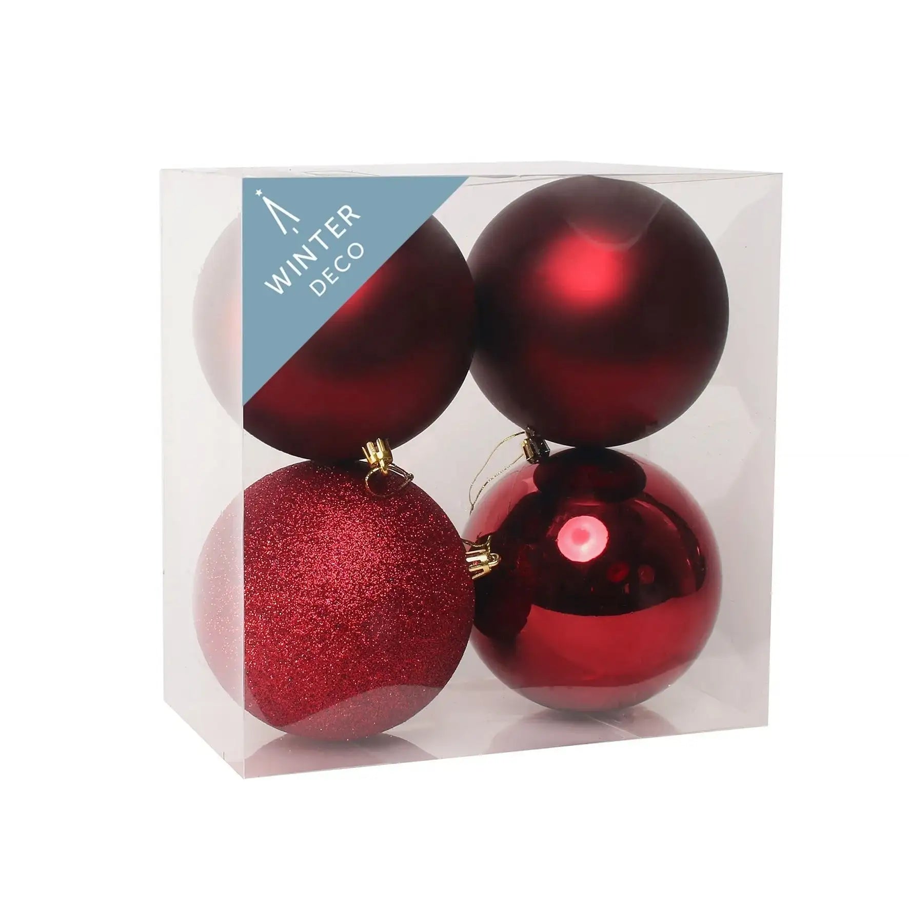 Red Christmas ornaments in clear box, assorted finishes for holiday tree decor