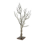 Decorative artificial tree with bare branches on a wooden base for home décor