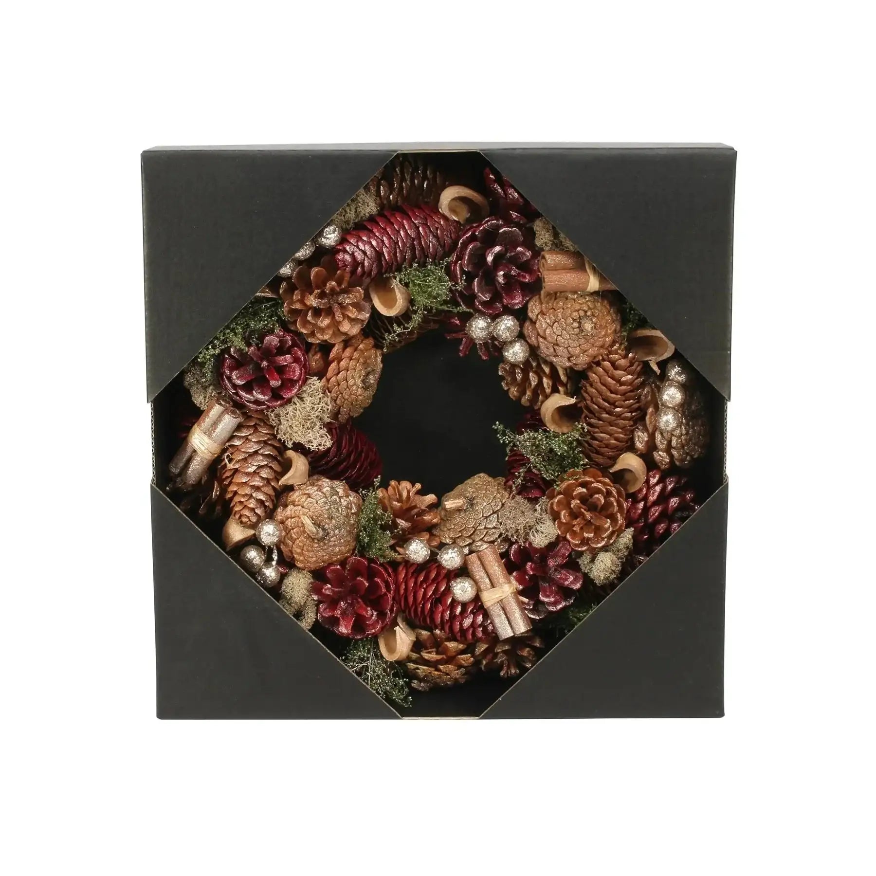 Festive pinecone wreath with red and gold accents in a black gift box, home décor