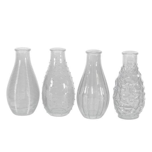 Set of four clear decorative glass vases with textured patterns, ideal for home décor