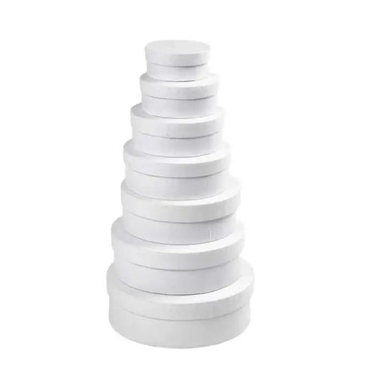 Stacked white round nesting boxes for home décor or gift packaging