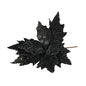Black glitter leaf decoration with berries for home décor and festive occasions