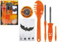 Pumpkin carving kit with orange tools, pumpkin light, stencils, and saw for Halloween decor