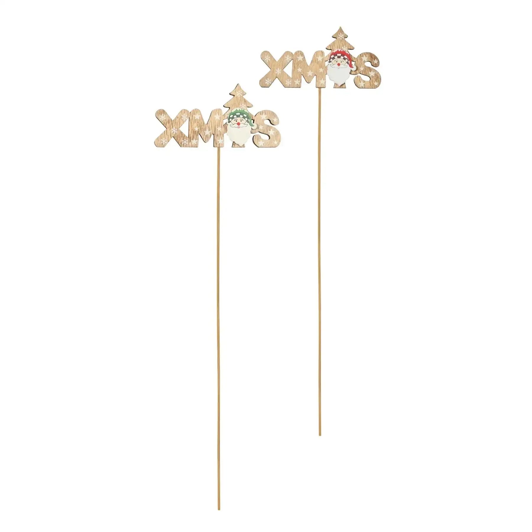 Wooden Christmas cake toppers with 'XMAS' text, Santa, and tree design on white background.