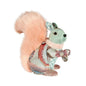 Plush decorative squirrel figurine with pastel fur, patterned fabric, and jeweled accents
