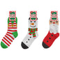 Festive ladies' cozy socks with elf, snowman, and Santa designs for holiday gifting and seasonal décor