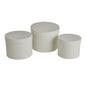 Set of three white round storage boxes with lids, ideal for home décor and gift organization