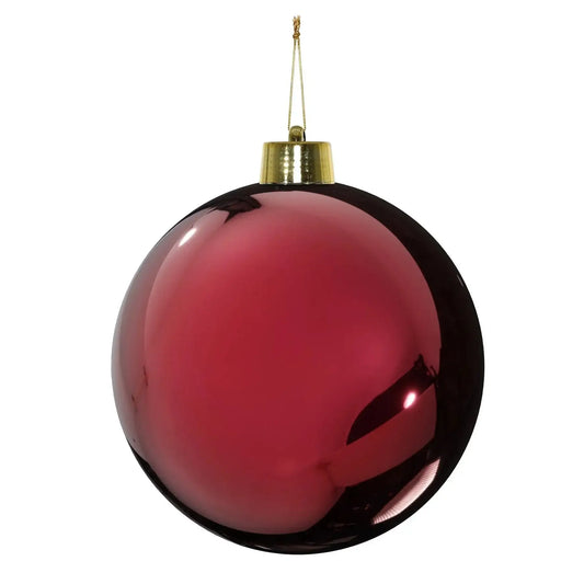 Glossy red Christmas bauble with gold cap, perfect for festive tree decoration and holiday home décor