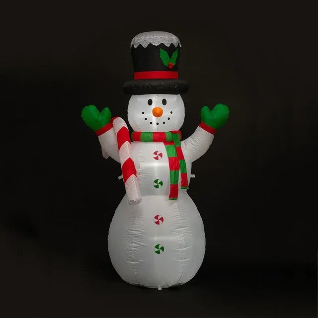 Inflatable Christmas snowman decoration with candy cane, scarf, and top hat on black background