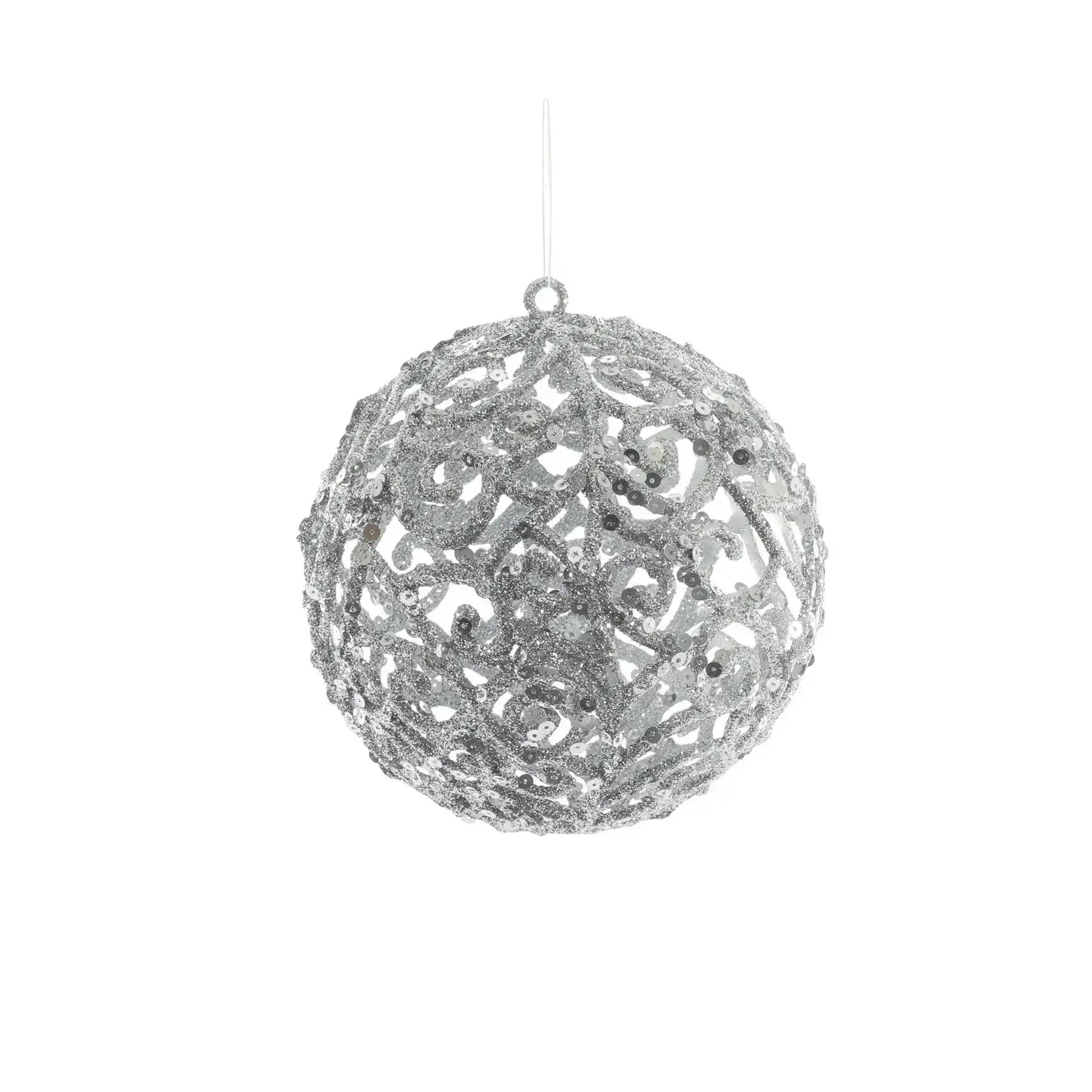 Silver glitter filigree Christmas ornament ball with sequins on white background