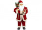 Santa Claus figurine holding gift and festive greenery, Christmas holiday décor