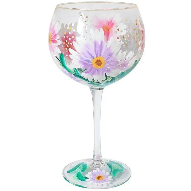 Hand-painted wine glass with colorful daisy flower design, ideal for home décor or gifting