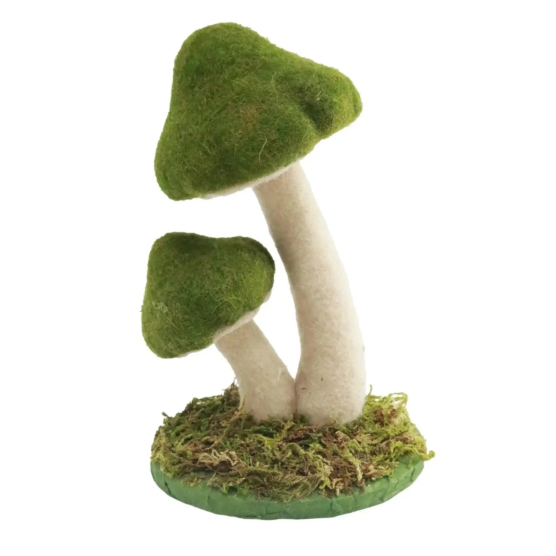 Felt mushroom decor with green caps and white stems on a mossy base, whimsical home accent