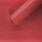 Red gift wrap roll with textured finish, ideal for presents and home décor.