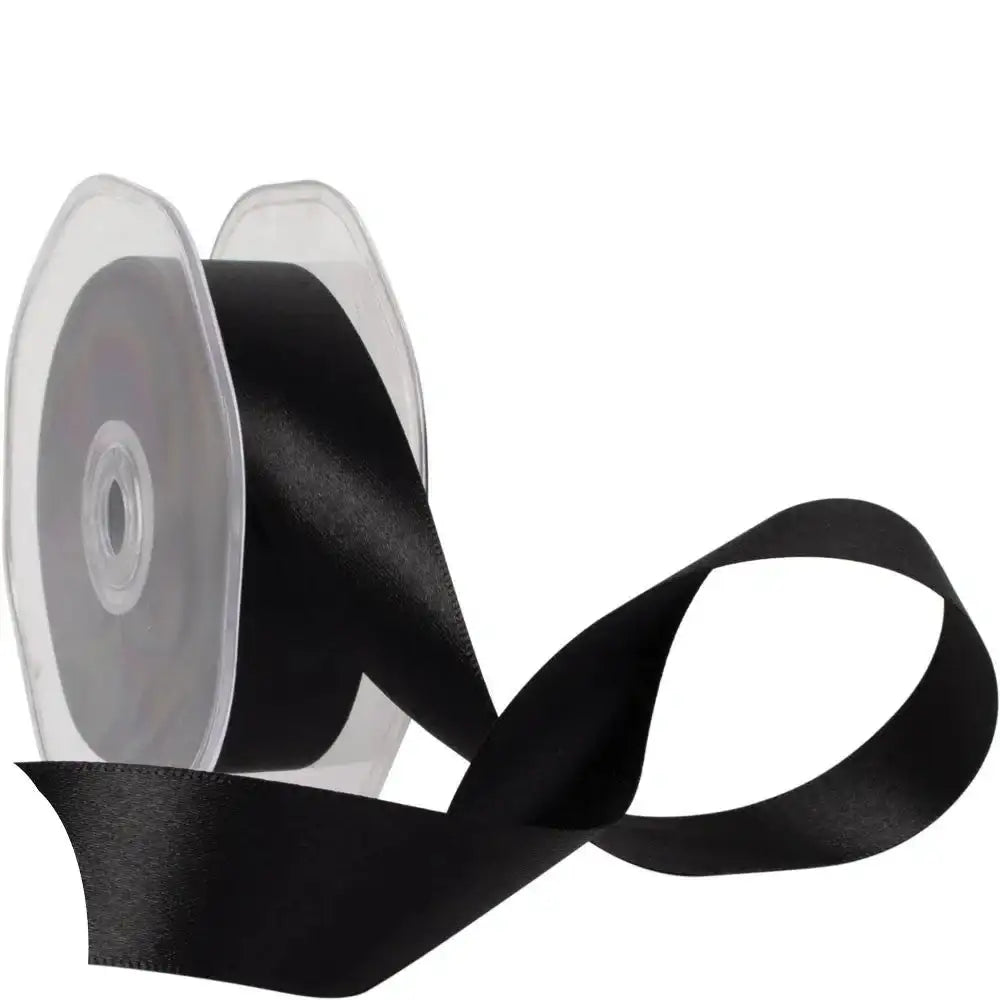 Black satin ribbon spool, ideal for gift wrapping and home décor crafts