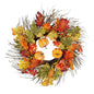 Autumn wreath with orange pumpkins, artificial leaves, berries and twigs, festive home décor