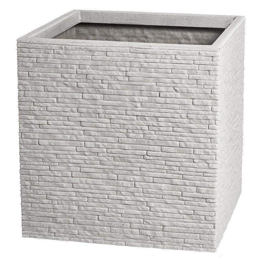 Modern square stone planter with textured brick design, ideal for home décor or garden use