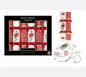 Box of deluxe Christmas crackers with festive poinsettia design and included novelty gifts
