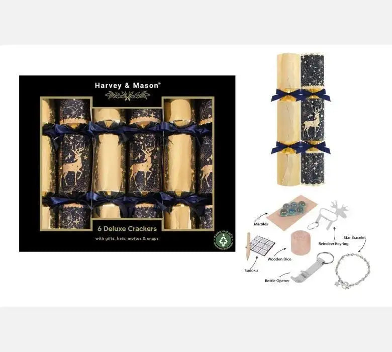 Box of six gold and navy deluxe Christmas crackers with reindeer design, shown with included gifts like a bracelet, keyring, and marbles.