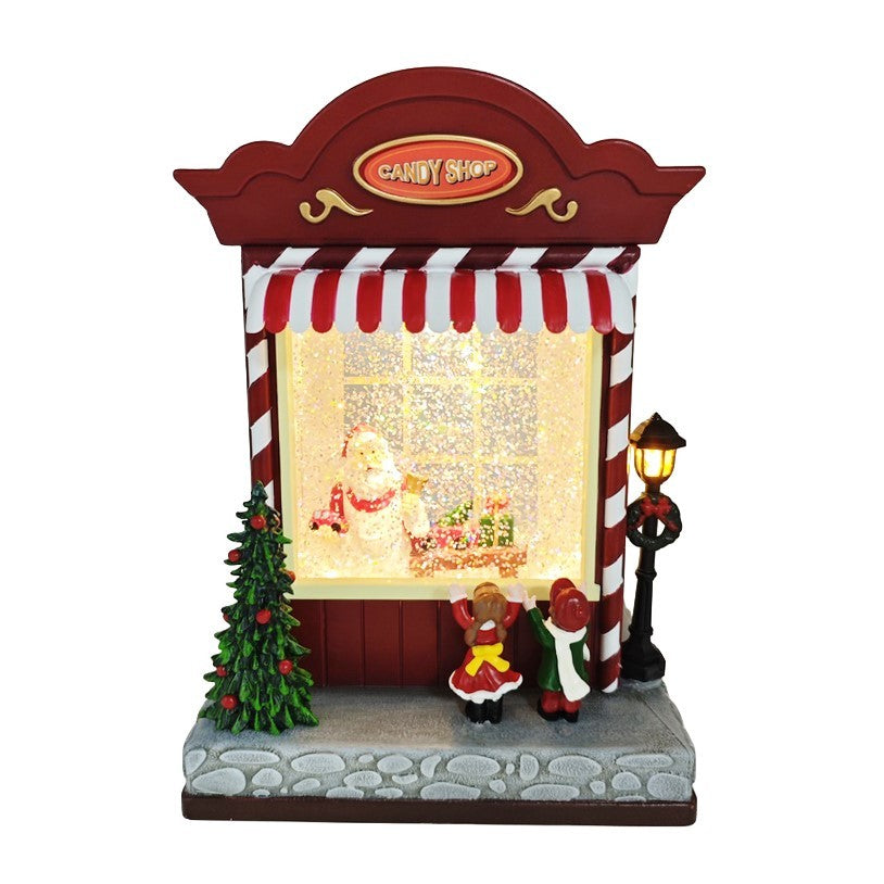 Discover the Red Santa Sweet Shop Light Up Snow Globe (22cm) at Bristow Direct