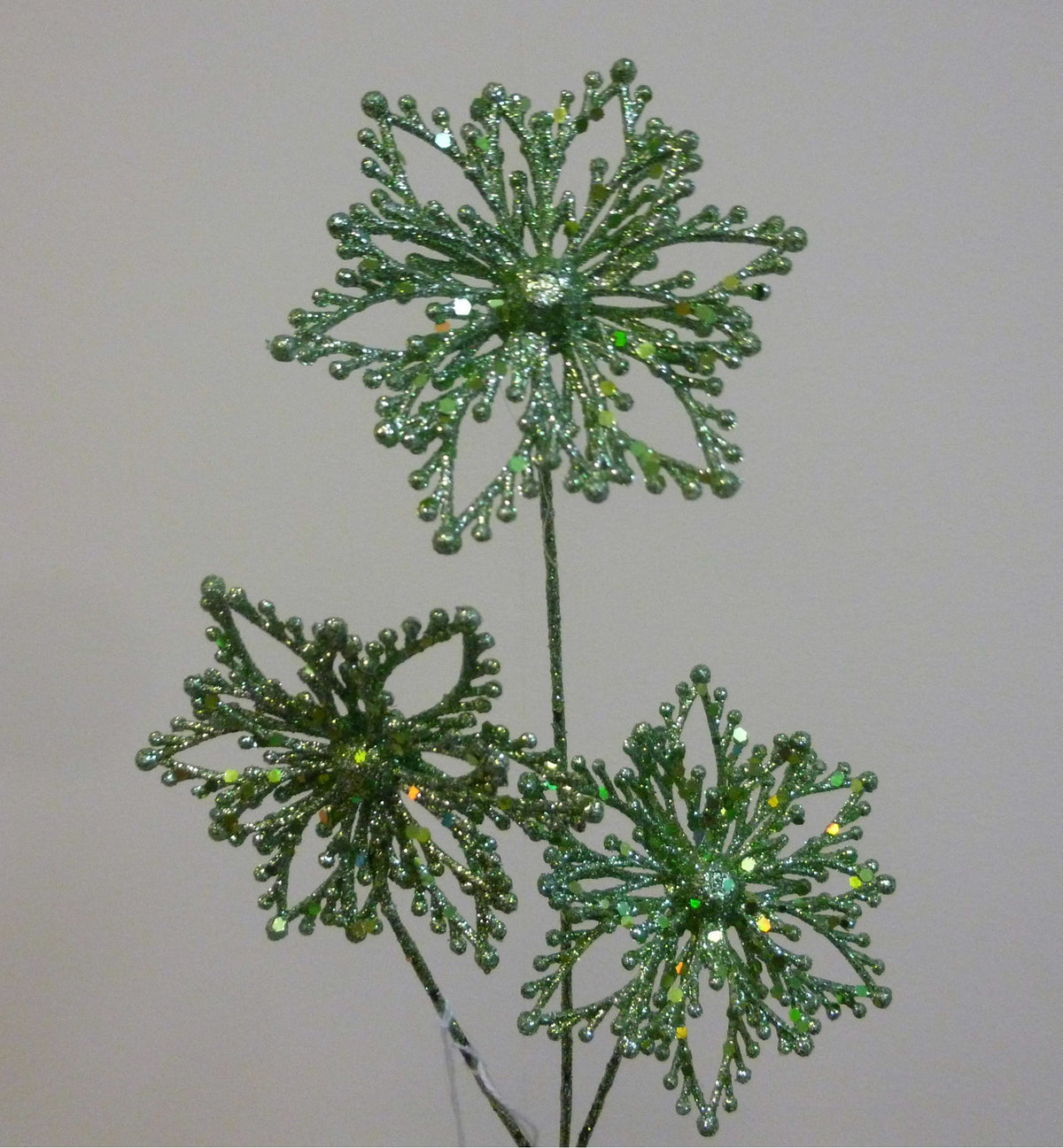 Discover the Green Glitter Poinsettia Pick (36cm) at Bristow Direct