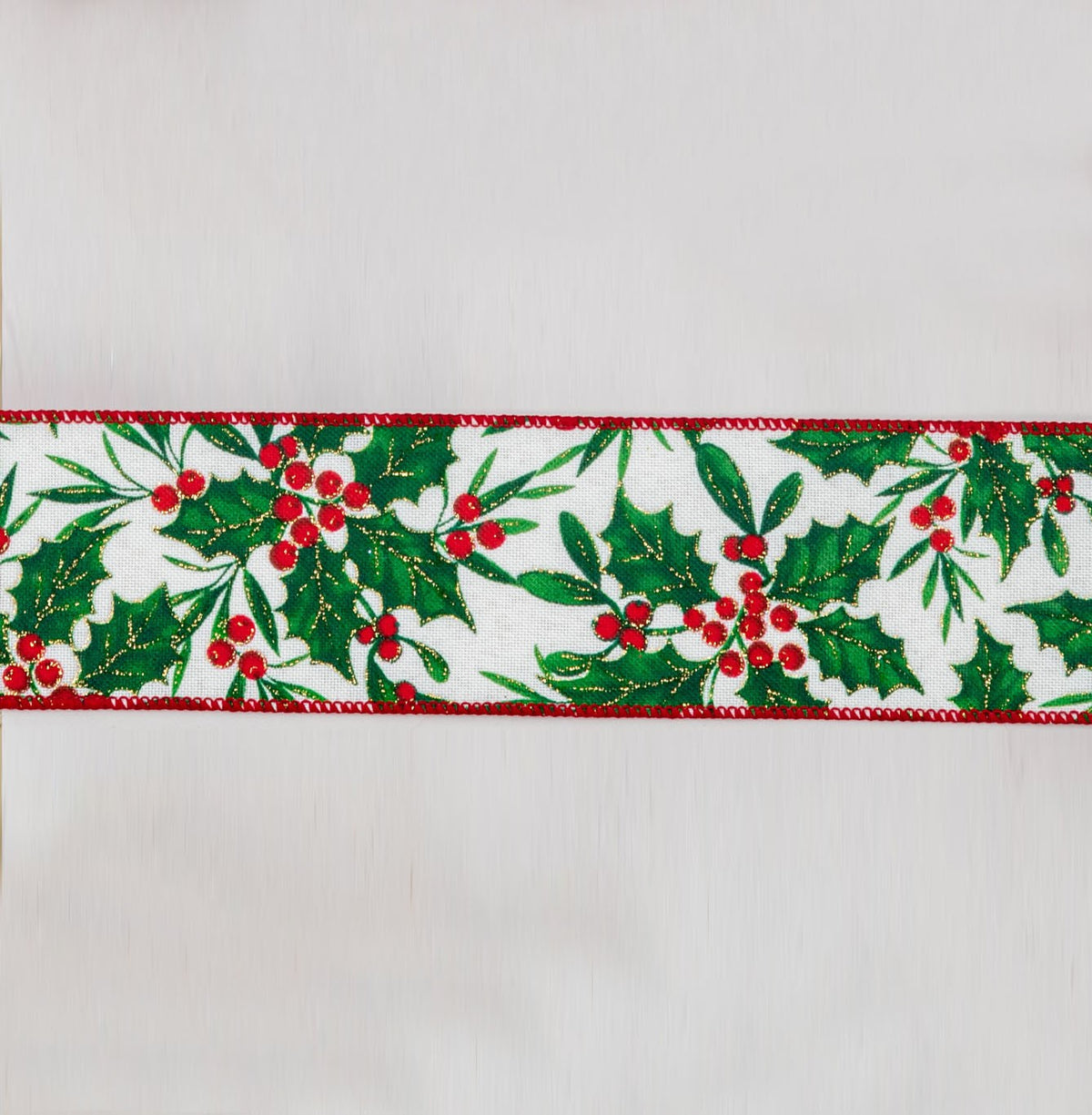 Discover the Red Green on White Holly Berries Ribbon (63mm x 9.1m) at Bristow Direct
