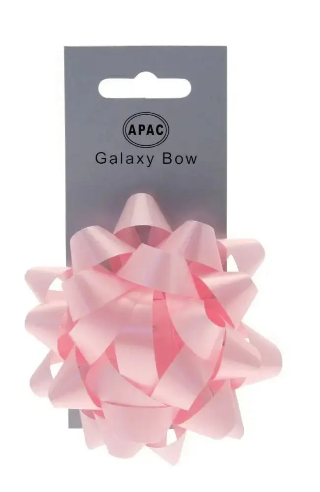 Light pink gift bow on packaging card, festive ribbon for present wrapping and decoration