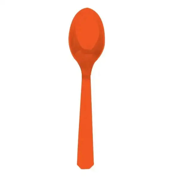 Bright orange plastic spoon on a white background, party tableware