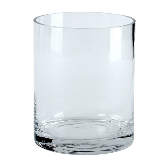 Clear glass tumbler, simple cylindrical drinking glass on white background