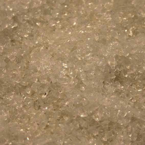 Close-up of clear decorative crushed glass pieces for home décor accents