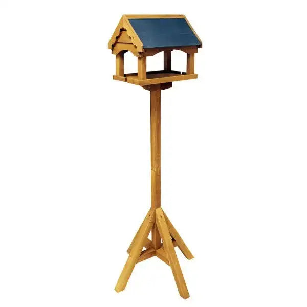 Wooden outdoor bird feeder with pitched roof and tripod stand for garden décor