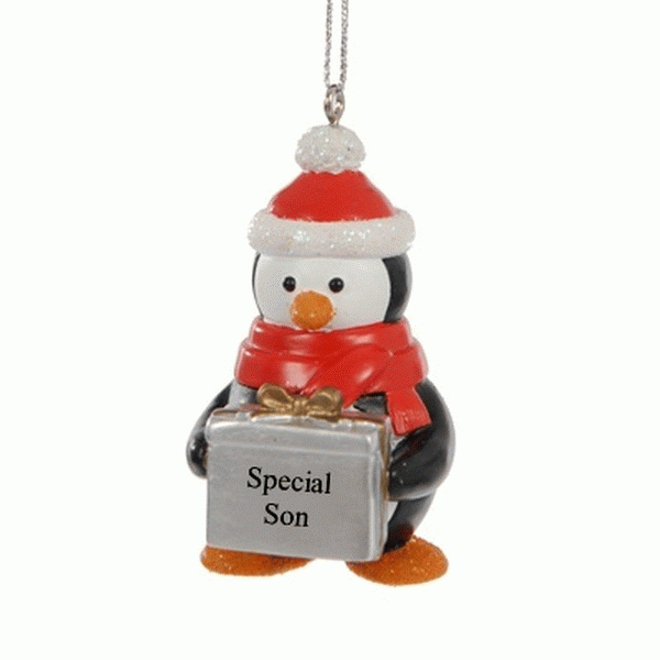 Penguin ornament with Santa hat and red scarf holding a gift labeled 'Special Son'
